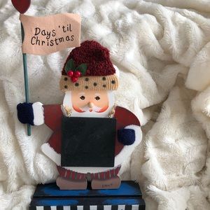 Elaine Thompson Standing Santa